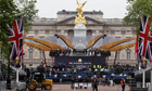 Workers prepare the stage for the diamond jubilee concert in front of Buckingham Palace